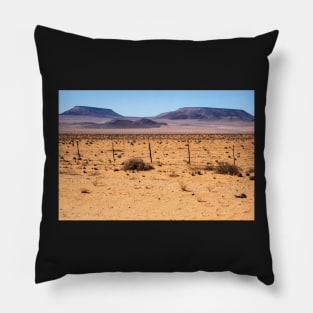 Fence across the desert. Pillow