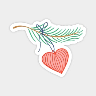 Decorative heart on pine twig. Magnet