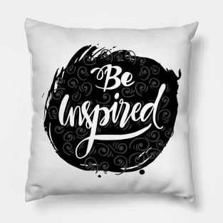 Be inspired phrase hand lettering with feathers. Pillow