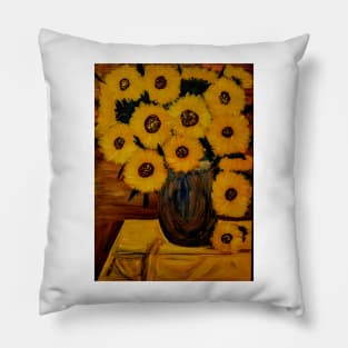 Sunflowers I'm a metallic blue gold and bronze and turquoise vase. On a table with yellow table cloth Pillow