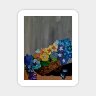 A bouquet of pansies flowers in a wicker basket Magnet