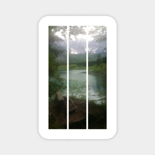 A static shot from the shore of Fusine lake in the Julian Alps with snowy mountains in background and a bench. Beautiful nature in a spring cloudy day; no people around. Italy (vertical) Magnet