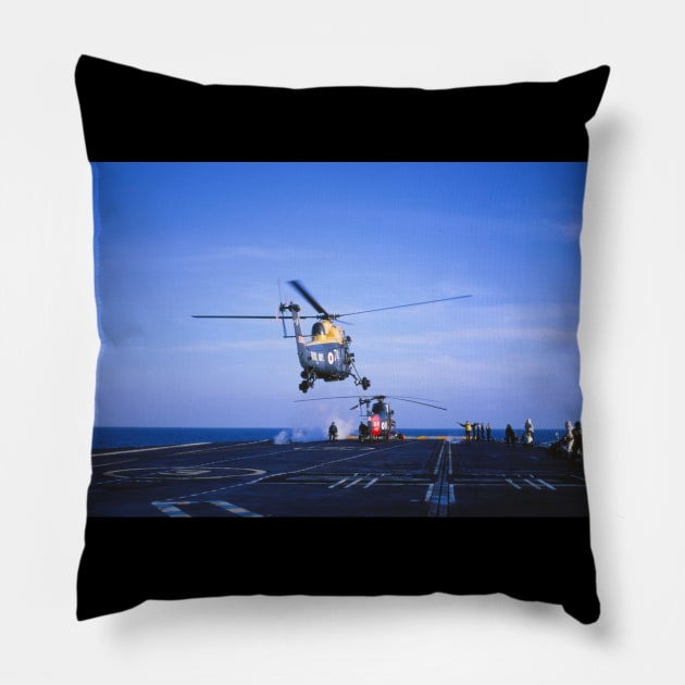 A Westland Wessex helicopter landing on the Royal Navy aircraft carrier HMS Hermes in the 1960s Pillow by ownedandloved