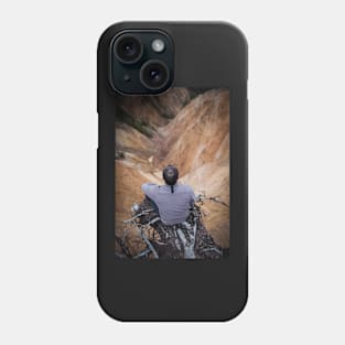 Sitting on the edge of a cliff Phone Case