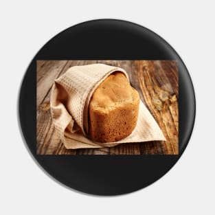 Homemade bread on a wooden board Pin