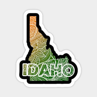 Colorful mandala art map of Idaho with text in green and orange Magnet