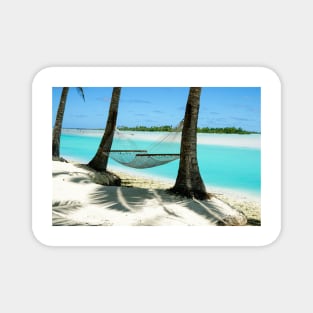 Empty hammock between two tropical palm trees in Cook Islands. Magnet