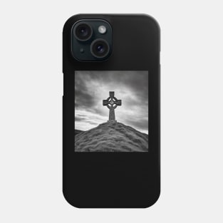 Ancient Celtic Cross on a Burial Mound hill on a hill beneath a stormy, angry sky Phone Case