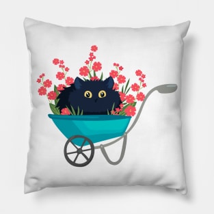 black cat in a garden wheelbarrow with red flowers Pillow