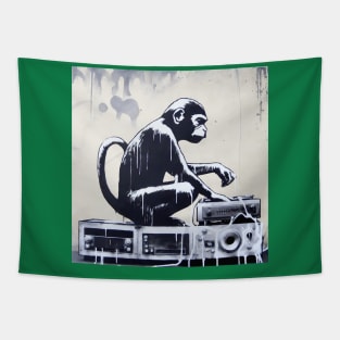 Side view of Banksy monkey playing on vinyl record Tapestry