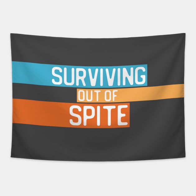 "Surviving out of spite" in white letters on colorful blocks - blue, yellow, and orange Tapestry by PlanetSnark