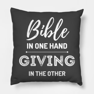 Bible in one Hand, giving in the other Pillow