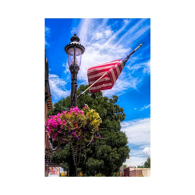 Pretty All American Lamp Post Flowers And Flag by Debra Martz