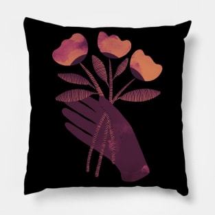 Brown hand with brown orange and pink flowers on black background Pillow