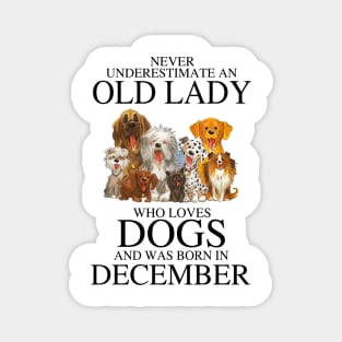 Never Underestimate An Old Lady Who Loves Dogs And Was Born In December Magnet