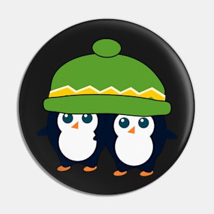 When two cute penguins find a beanie Pin