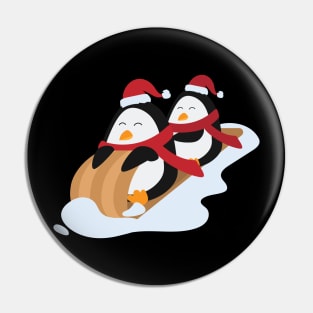 Penguins wearing santa hat Pin