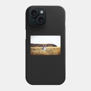 Dog in flower field Phone Case