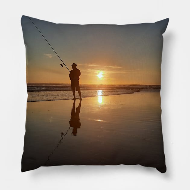 A sea fishing man at a sunset beach Pillow by kall3bu