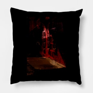 Special processing. Person walking at night, on dark street, with stone walls. Red. Pillow