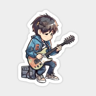 A boy playing his favourite guitar Magnet