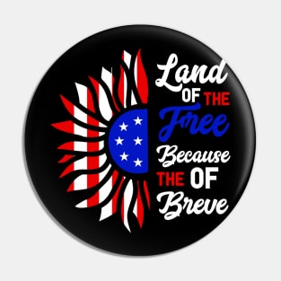 Patriotic Slogan with American Flag Motif, Bold graphic featuring the phrase "Land of the Free Because of the Brave" with an American flag-inspired design. Pin