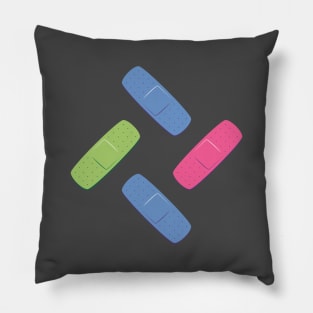 Pink, green and blue bandages Pillow