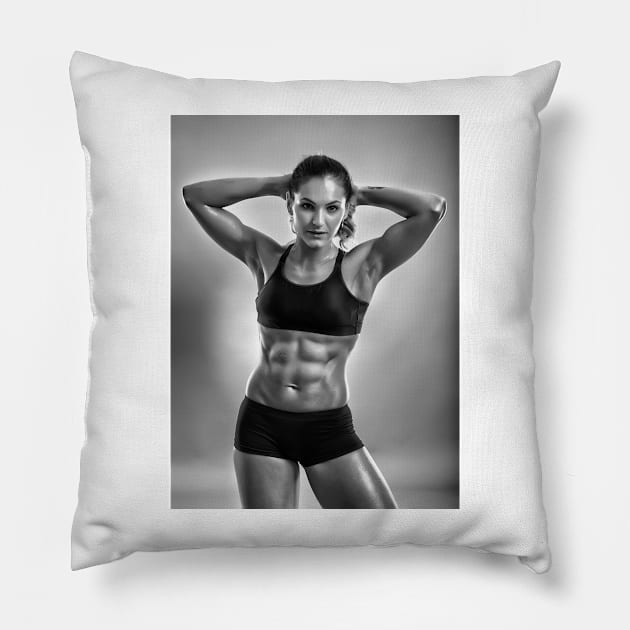 Fitness woman posing in studio Pillow by naturalis