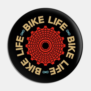 Red bicycle cassette with Bike Life legend over black background Pin