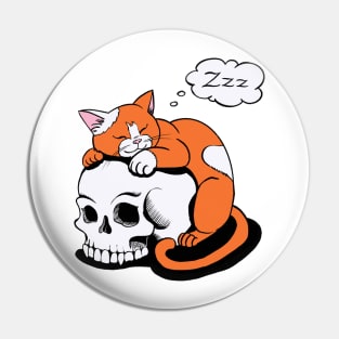 red orange cat sleeping on the vampire skull Pin