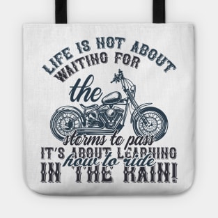 Life is not about waiting for the storms to passit s about learning how to ride in the rain  T Shirt For Women Men Tote