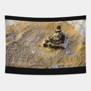 Merry Christmas letters in sand with Santa Claus on beach 2 Tapestry