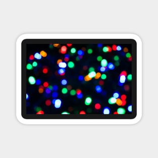 Abstract blurred effect Illuminated closeup of tangled Christmas lights Magnet