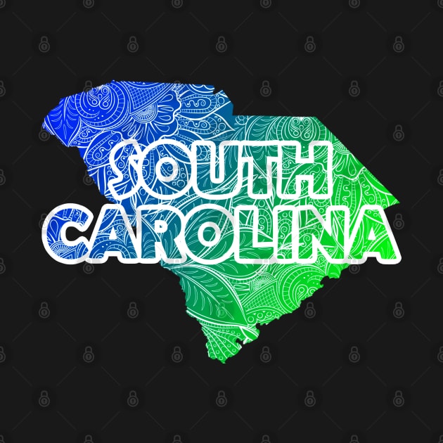 Colorful mandala art map of South Carolina with text in blue and green by Happy Citizen
