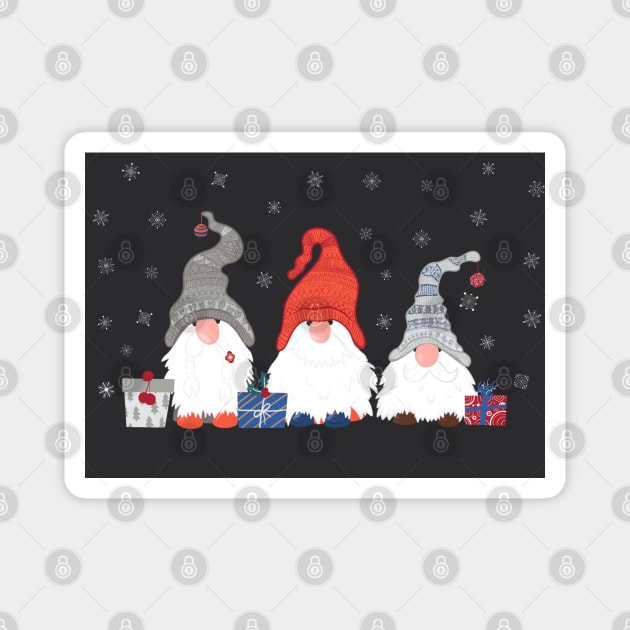 Three Christmas Gnomes with Snowflakes and Presents on Dark Grey Background Magnet by NattyDesigns