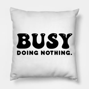 Busy doing nothing- black text Pillow