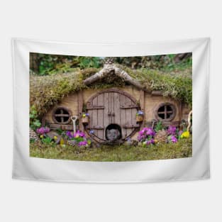 George the mouse in a log pile house - summer flowers Tapestry