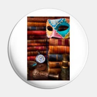 Old Mask On Stack Of Antique Books Pin