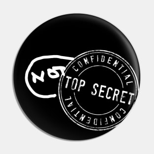 "Top Secret" stamp with "NOT" added in sharpie, white Pin