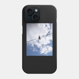 Girl in slingshot against blue cloudy sky Phone Case