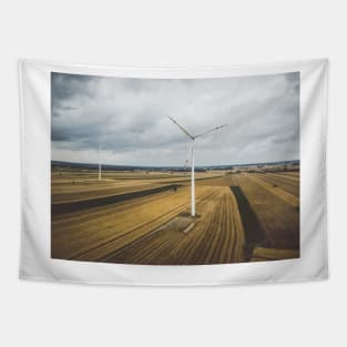 Aerial view of two windmills against cloudy sky Tapestry