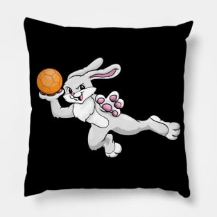 Funny bunny is playing handball Pillow