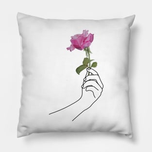 Hand holding a rose Pillow