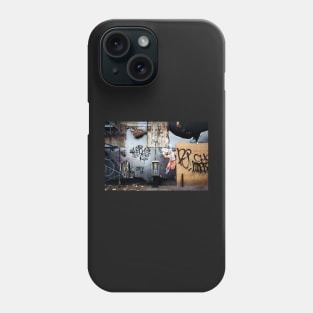 Decaying urban brick wall with graffiti paint and street art in New York City Phone Case