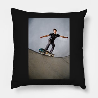 Skateboarder doing a grind Pillow