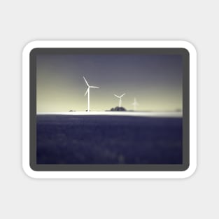 Black and white photo with scenic view of three power windmill turbines on clear sky and rye crop with half sun shadow Magnet