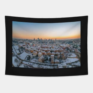 Warsaw old town, snow-covered roofs and and distant city center Tapestry