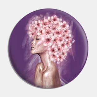 Pretty young girl with flowers in hair. Pin