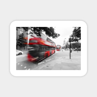 Red double-decker bus on the street of London Magnet