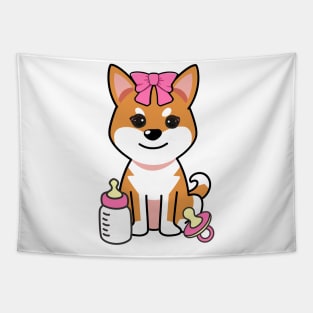 cute baby orange dog wears a pink ribbon Tapestry